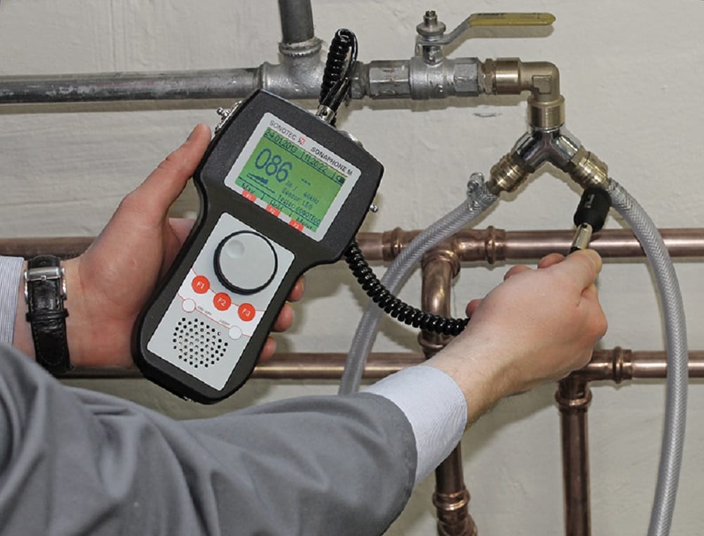Plumber testing pipes with electronic leak detection equipment in Murrieta